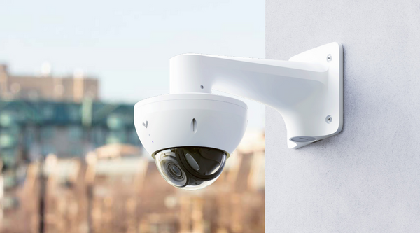 Verkada's ACC-MNT-ARM-1 Arm Mount with a Verkada Security Camera mounted on a wall.